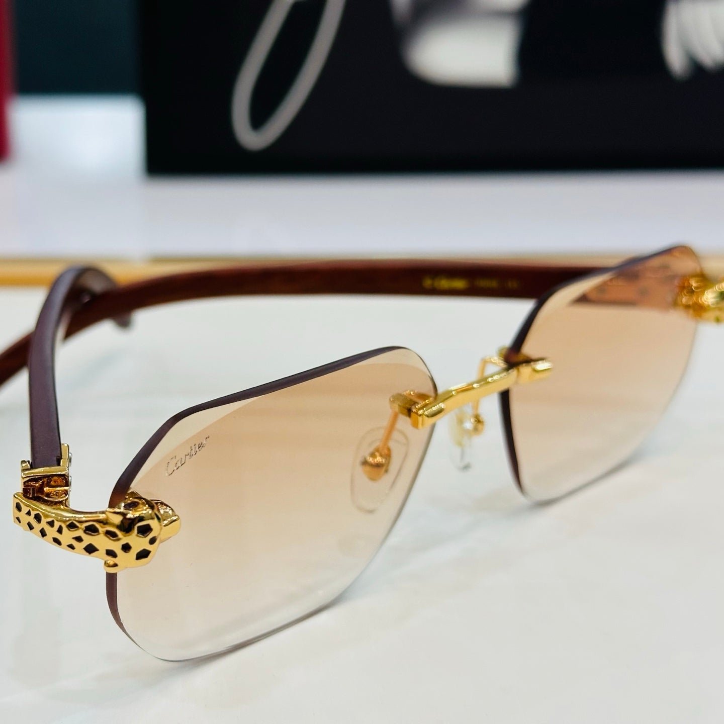PANTHÈRE RIMLESS OVAL FRAME SUNGLASSES 543637 IN METAL - Image 9